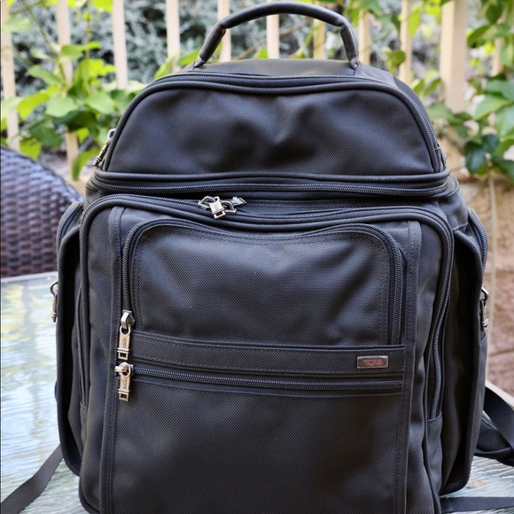 tumi canvas backpack